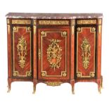 A 19TH CENTURY FRENCH ORMOLU MOUNTED KINGWOOD SIDE CABINET with rouge marble top above a leaf cast