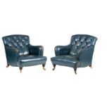 A PAIR OF LATE 19TH CENTURY LOW BACK BUTTON UPHOLSTERED BLUE LEATHER DRAWING ROOM CHAIRS BY HOWARD