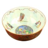 A RARE WEDGWOOD FAIRYLAND LUSTRE PORCELAIN THUMBELINA FROG BOWL decorated in the Firblogs pattern to