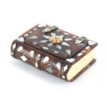 AN 18TH CENTURY TORTOISESHELL AND BONE SNUFF BOX FORMED AS A BOOK with mother of pearl inlays and