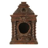 A 17TH CENTURY CARVED OAK JACOBEAN CLOCK CASE/FRAME the elaborate case with barley twist