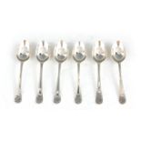 A SET OF SIX GEORGE V GOLFING SILVER TEASPOONS decorated with Golf Clubs 11cm wide Sheffield by