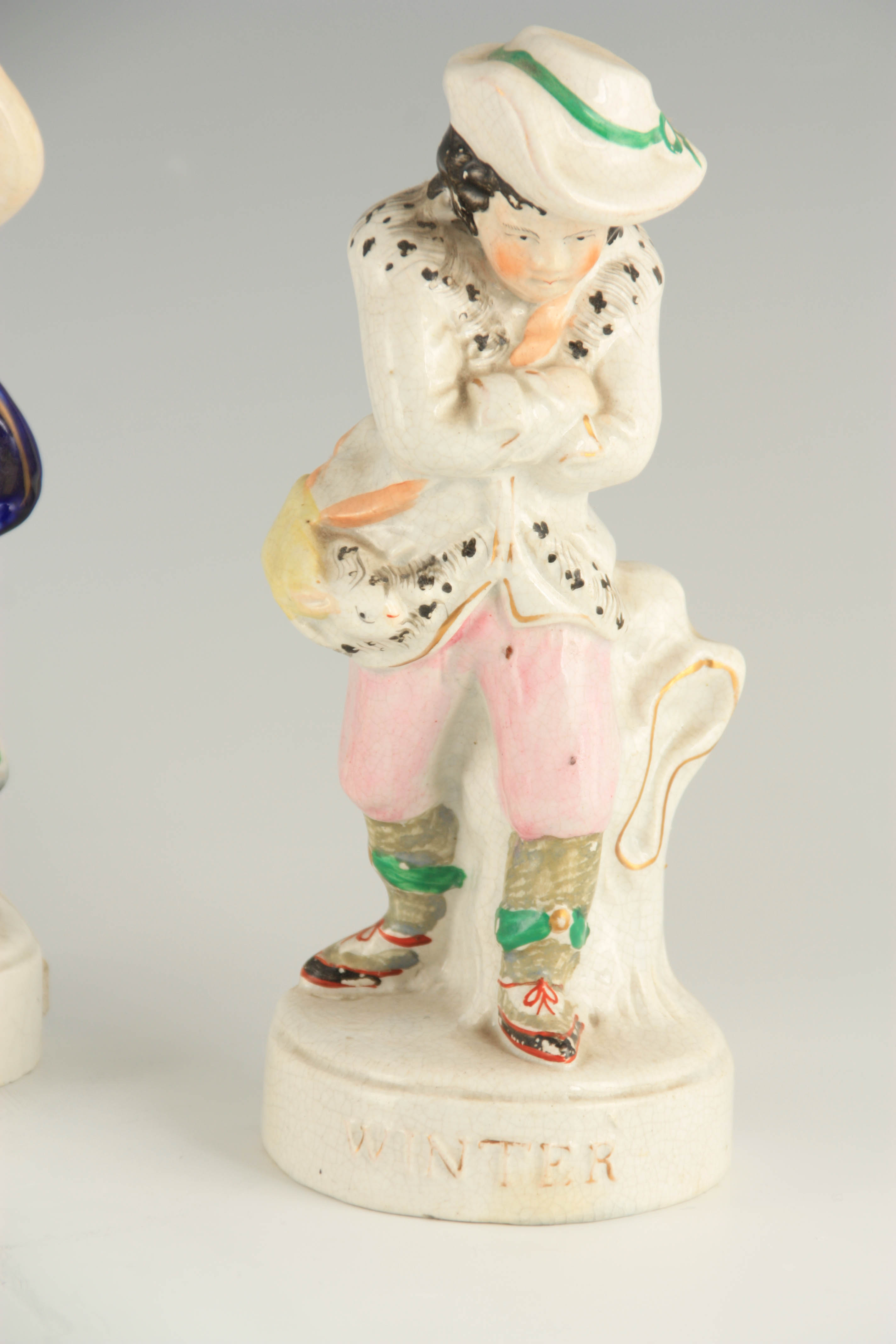 A PAIR OF 19TH CENTURY STANDING STAFFORDSHIRE FIGURES of Spring and Winter 21.5 and 21cm high - Image 6 of 7