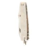 A 20TH CENTURY STEEL CASED MULTI-BLADE FOLDING KNIFE blade etched 'Coutellerie Du Mont-Blanc Geneve'