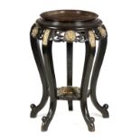 A 19TH CENTURY CHINESE EBONISED HARDWOOD JARDINIERE STAND with ringed top and brass lions head