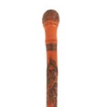 AN EARLY 20TH CENTURY CHINESE CARVED BAMBOO WALKING STICK decorated with animals set in trees 87cm