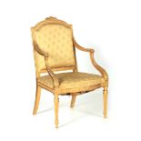A GEORGE III CHIPPENDALE STYLE CARVED GILTWOOD OPEN ARMCHAIR with ribbon carved top rail and