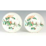 A PAIR OF CHINESE PORCELAIN FAMILLE VERTE DISHES decorated with elephants and a Scholar in a