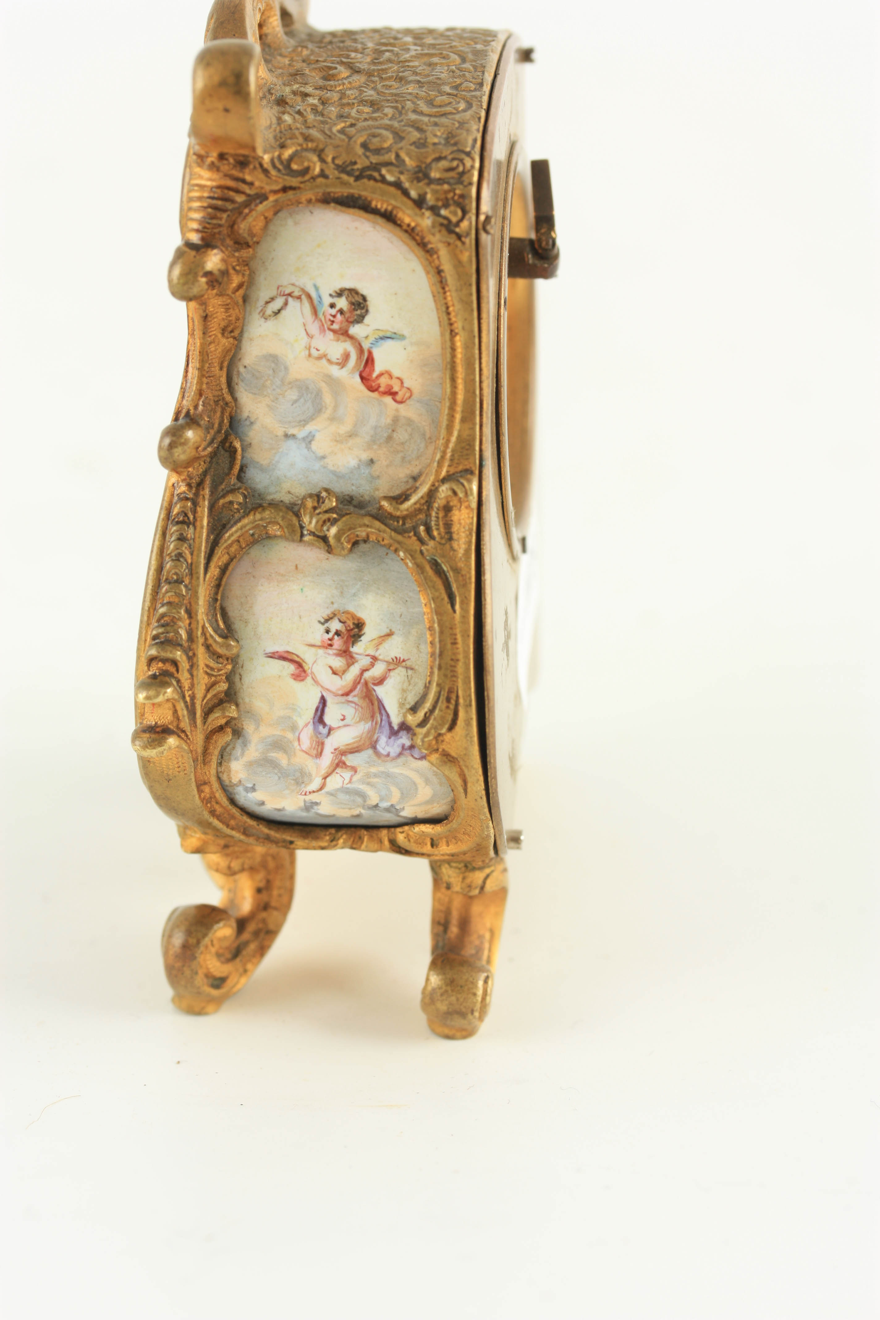 A LATE 19TH CENTURY VIENNESE ENAMEL AND GILT MOUNTED BOUDOIR CLOCK the bombe shaped case with rococo - Image 5 of 6