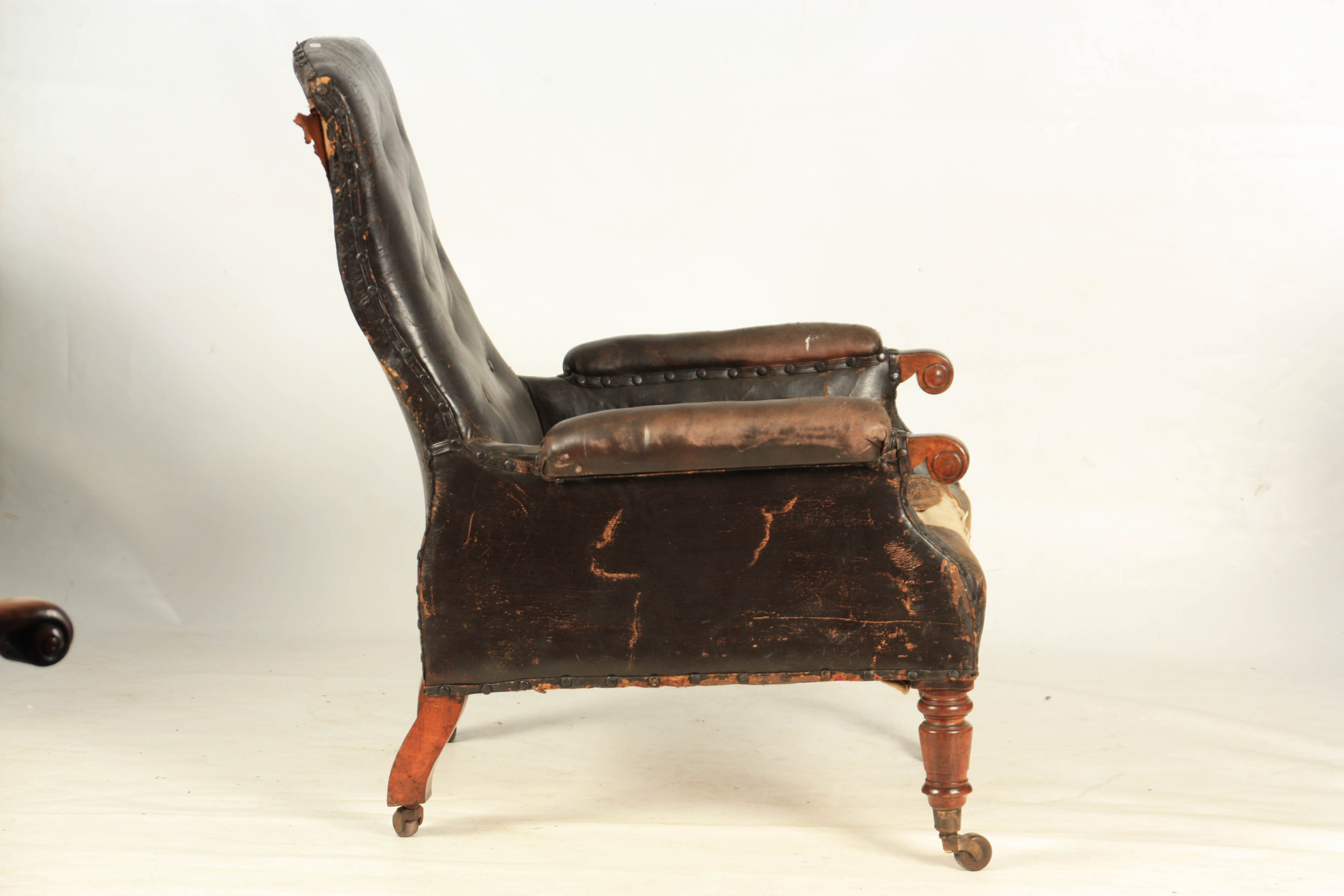 A LATE REGENCY BUTTON UPHOLSTERED LEATHER LIBRARY CHAIR with shaped button back and mahogany - Image 7 of 8