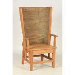 A LATE 19TH CENTURY PINE ORKNEY CHAIR with screwed framework, open arms and boarded seat; with a