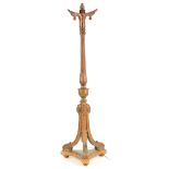 A CARVED GILTWOOD STANDARD LAMP IN THE MANNER OF GEORGE ADAM with reeded tapering stem and