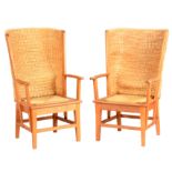 A PAIR OF 20TH CENTURY SCREWED OAK FRAMED ORKNEY CHAIRS with reeded rounded backs and drop in