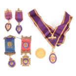 A COLLECTION OF FOUR SILVER GILT AND ENAMEL MASONIC AND ORDER OF THE BUFFALO MEDALS together with