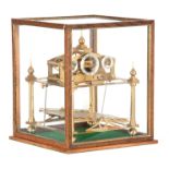 A 20TH CENTURY CONGREVE ROLLING BALL CLOCK having a triangular pediment supported on four tapering