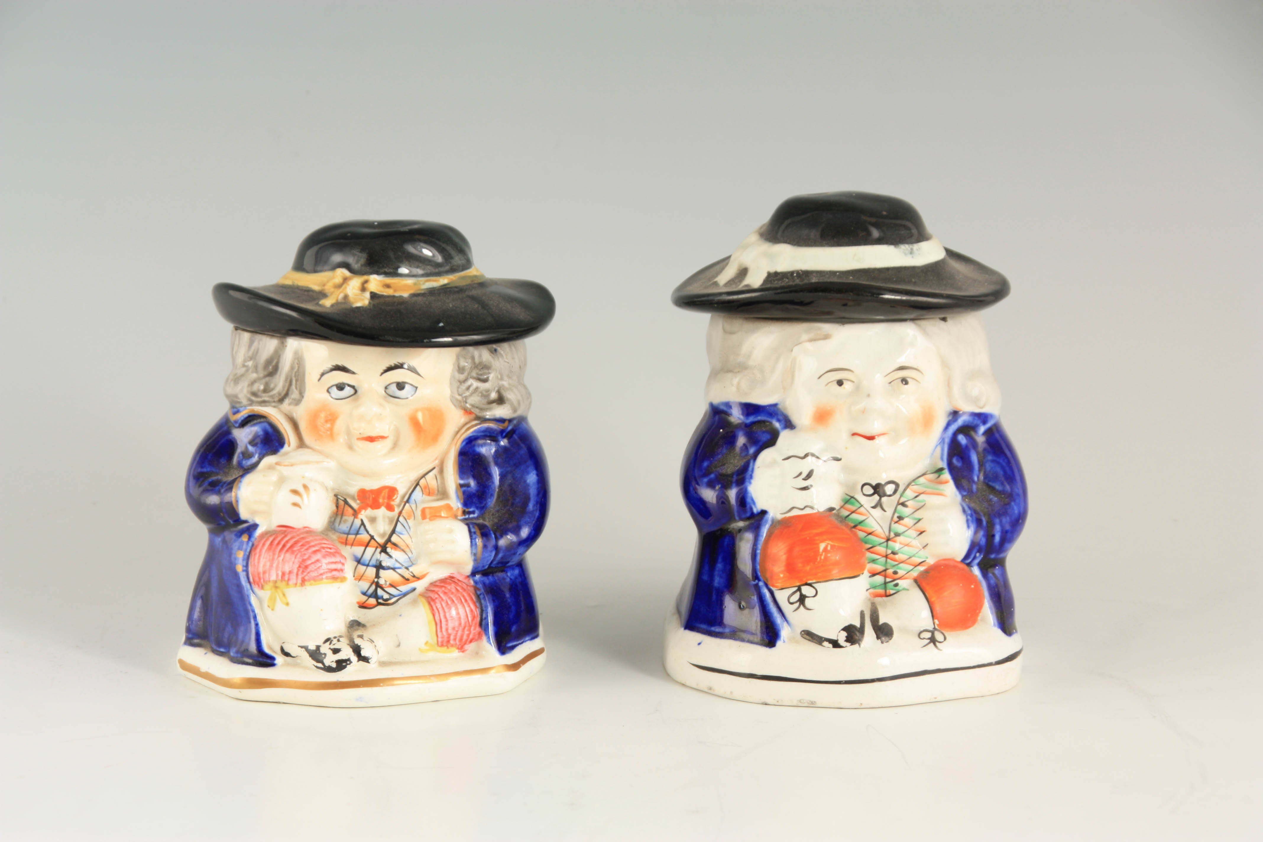 A PAIR OF COLOURFUL SEATED TOBY FIGURE LIDDED JARS 12.5cm high - Image 2 of 4