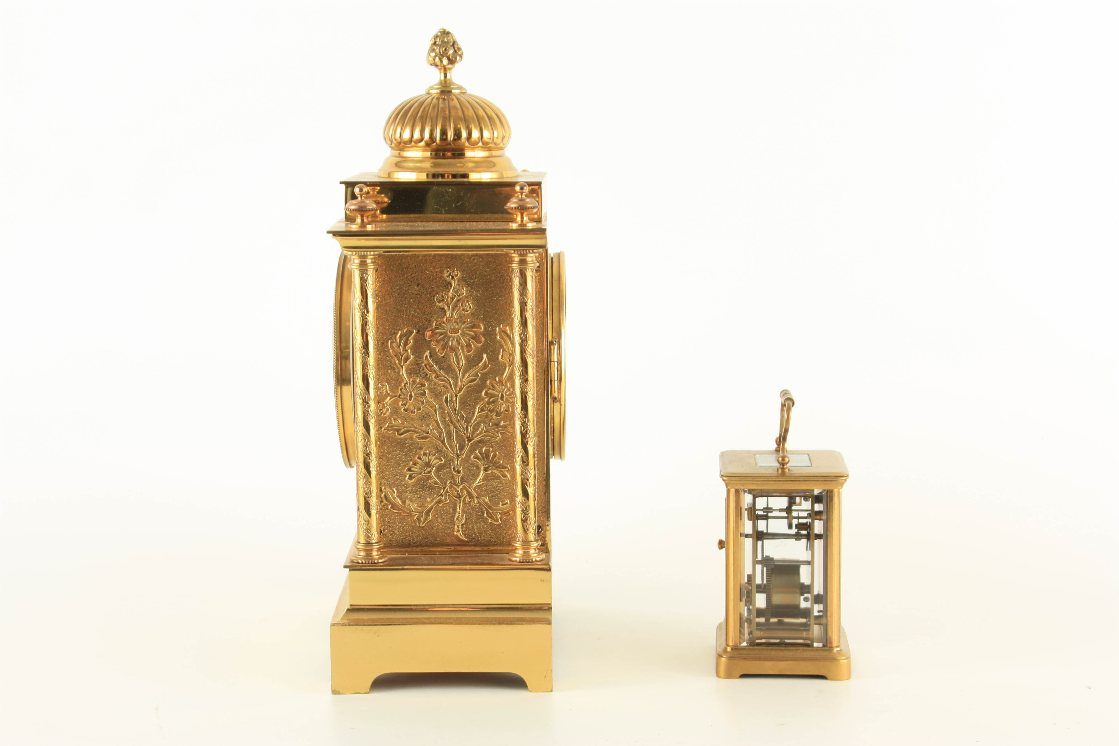 A LATE 19TH CENTURY FRENCH BRASS CASED MANTEL CLOCK having a domed top pediment above a floral - Image 6 of 12