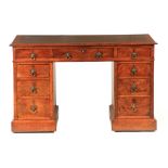 A 19TH CENTURY POLLARD OAK GOTHIC STYLE PEDESTAL DESK with original well-patinated leather top above