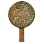 A LATE 19TH CENTURY JAPANESE CIRCULAR HAND MIRROR with pine branch decoration and row of cyphers