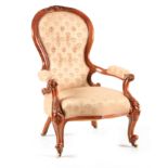 A MID 19TH CENTURY WALNUT UPHOLSTERED DRAWING ROOM CHAIR with shaped button back, joined by open