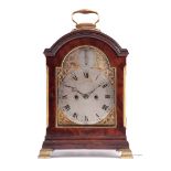 A GOOD GEORGE III GILT BRASS MOUNTED FLAME VENEER MAHOGANY BREAK ARCH PAD TOP BRACKET CLOCK the