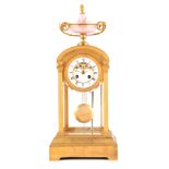 A LATE 19TH CENTURY FRENCH ORMOLU FOUR-GLASS MANTEL CLOCK surmounted by a large Serves-style