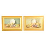 D. E. W. MARTIN A PAIR OF STILL LIFE WATERCOLOURS depicting fruit on a table 23.5cm high 36cm wide -