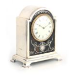 A GOOD EDWARDIAN SILVER AND TORTOISESHELL MANTEL CLOCK the arch-shaped case with Adam-style inlaid