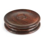 A 19TH CENTURY ROSEWOOD TURNED TABLE SNUFF BOX with ringed decoration to the lid 10.5cm diameter