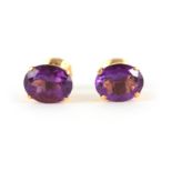 A PAIR OF LADIES 18CT YELLOW GOLD AMETHYST STUD EARRINGS app. 2.00ct, total weight 3.36g