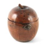 A GEORGE III STYLE FRUITWOOD TEA CADDY FORMED AS AN APPLE with metal fittings, lined interior and