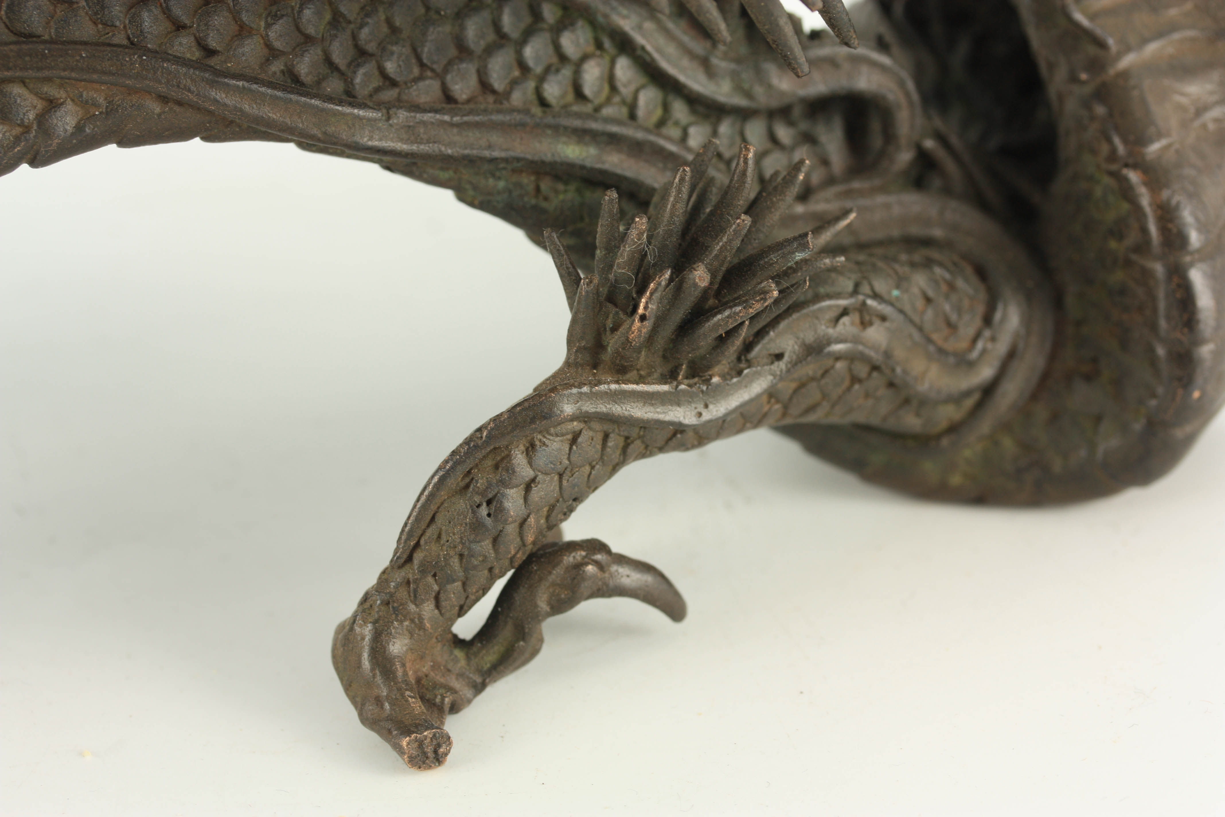 A MEIJI PERIOD JAPANESE BRONZE INCENSE BURNER modelled as a slender dragon holding a vessel 26cm - Image 4 of 7