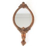 A 19TH CENTURY CONTINENTAL FINELY CARVED LINDENWOOD HAND MIRROR with leaf work surround and winged