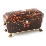 A FINE REGENCY TORTOISESHELL DOUBLE TEA CADDY of sarcophagus shape with lined sectional veneered