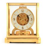 A 1970's JAEGER-LECOULTRE ATMOS CLOCK the glazed gilt case with canted corners enclosing a