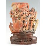 A LATE 19TH CENTURY CHINESE SOAPSTONE VASE ON STAND with finely carved woodland animals amongst