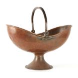 AN ARTS AND CRAFTS LARGE COPPER COAL BUCKET of plain double lipped boat-shaped design with