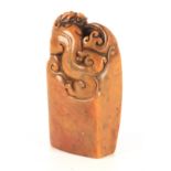 A CHINESE SOAPSTONE SEAL with carved dragon 7.5cm high