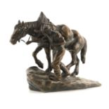 KORFF A 19TH CENTURY AUSTRIAN BRONZE SCULPTURE depicting a farmer and his workhorse 27cm wide 23cm