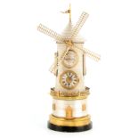A 19TH CENTURY FRENCH INDUSTRIAL AUTOMATION WINDMILL CLOCK the silvered brass case with turret top