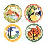 A SET OF FOUR LIMITED EDITION BLUE FIRS BIZARRE CLARICE CLIFF PLATES brightly decorated with tree-