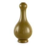 A CHINESE SAGE GREEN GLAZED PORCELAIN BOTTLENECK VASE - signed with character marks beneath 24cm