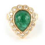 A LADIES 18CT YELLOW GOLD EMERALD AND DIAMOND RING having a large pear-shaped cabochon emerald, 10mm
