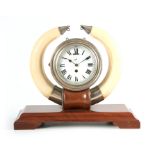 AN EARLY 20TH CENTURY HIPPOPOTAMUS TUSK TROPHY CLOCK having large nickel mounted hippo tusks