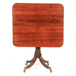 A REGENCY SOLID YEWWOOD TILT TOP TABLE with rectangular shaped top having rounded corners;