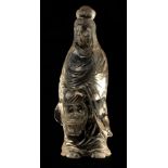 AN ORIENTAL STANDING ROCK CRYSTAL FIGURE OF A LADY 13.5cm high
