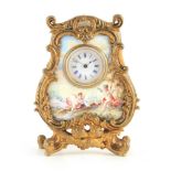 A LATE 19TH CENTURY VIENNESE ENAMEL AND GILT MOUNTED BOUDOIR CLOCK the bombe shaped case with rococo