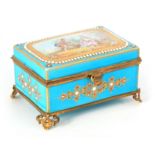 A MID 19TH CENTURY PORCELAIN SERVES STYLE ORMOLU MOUNTED CASKET with jewelled decoration enclosing a