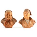 HANS HUGGLER A PAIR OF EARLY 20TH CENTURY SWISS POLYCHROME CARVED SCULPTURES depicting an elderly
