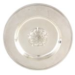 AN ELIZABETH II CASED SILVER TUDER ROSE DISH with ribbed edge and embossed flowerhead centre 30.
